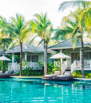 Resort buildings beside a swimming pool
