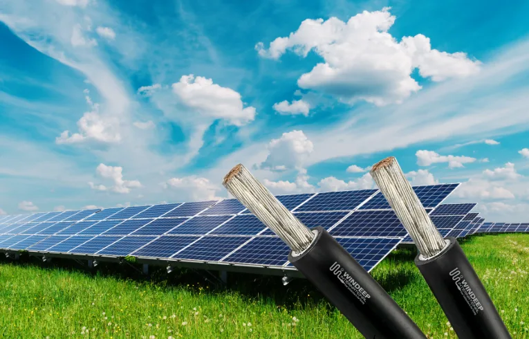 Solar cable conductors pictured in front of a photovoltaic array